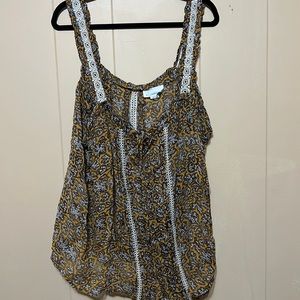 Yellow chiffon top with drawstring at top.